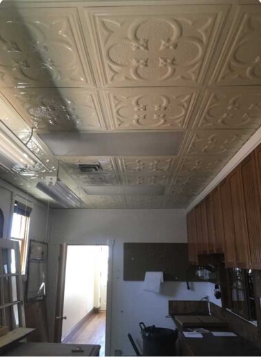 Twin Flame Gallery Renovations - Tin Ceiling Installed